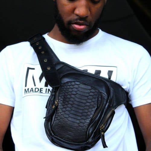 Mens black leather bag worn across the shoulder