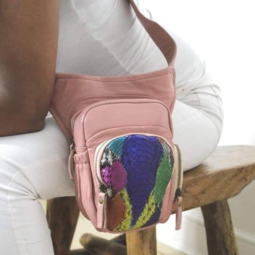 Small pink leather bad with strap and coloured pocket