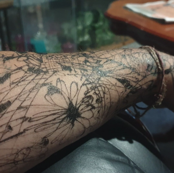 Arm tattoo